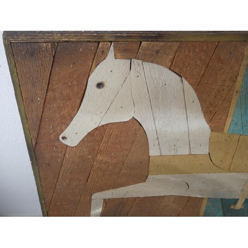 191 - A stunning handmade wooden folk art panel with horse design. Approx 77cm x 44cm.