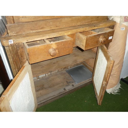 192 - A stunning antique pine two door kitchen cabinet with glass front doors.