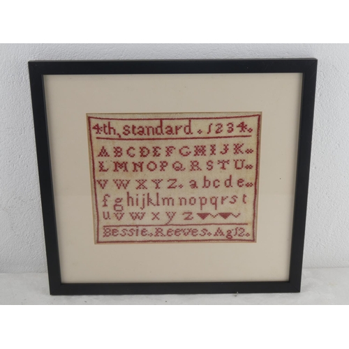 193 - An early 1900's sampler, worked in red cotton which is rare in a sampler with girls name, age and 4t... 