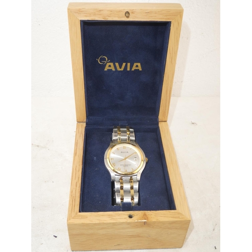 197 - An Avia wrist watch in original wooden box.