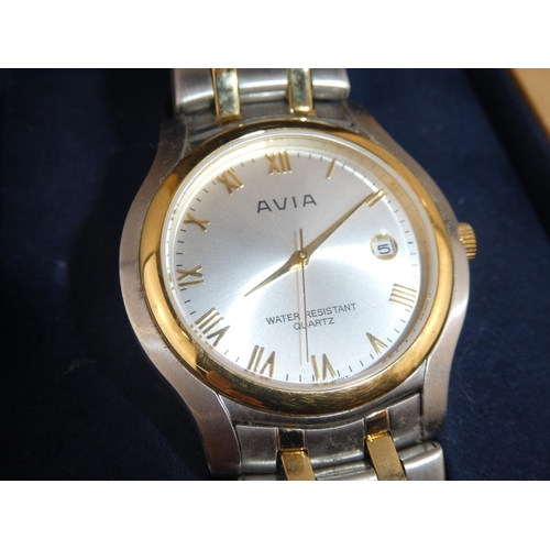 197 - An Avia wrist watch in original wooden box.