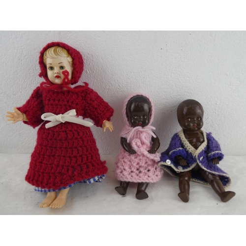 202 - Two Tudor Rose dolls with movable eyes and another.