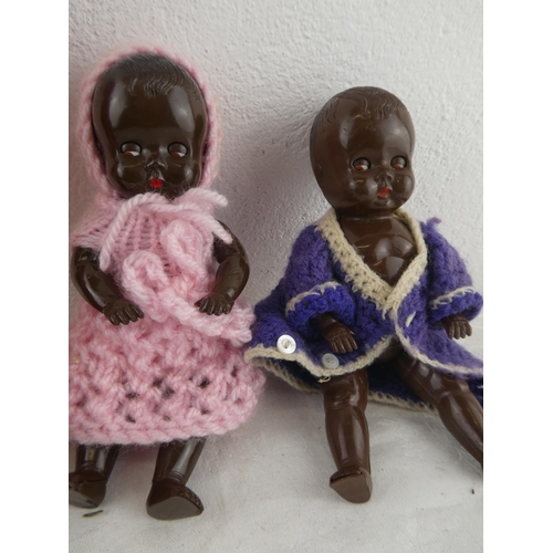 202 - Two Tudor Rose dolls with movable eyes and another.