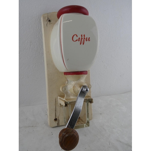 213 - A very nice 1950's enamel coffee grinder.