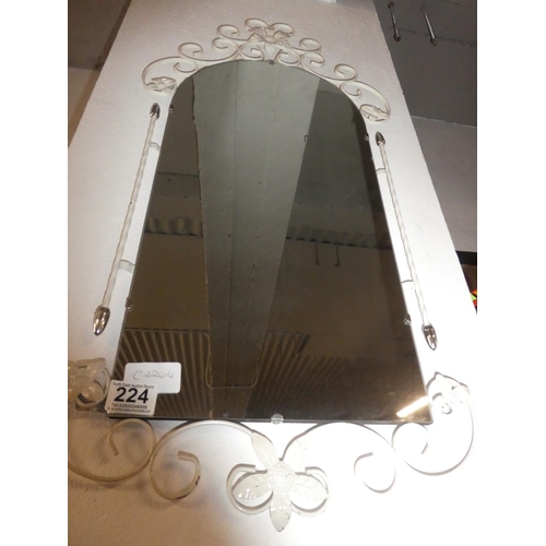 224 - A vintage metal framed hall mirror.