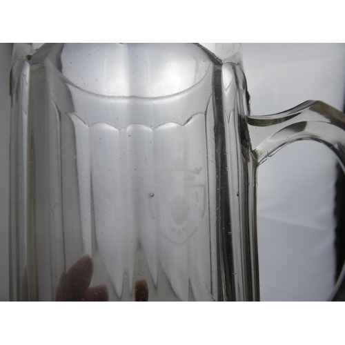 257 - A pair of vintage glass beer tankards.