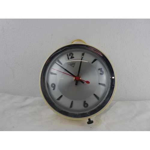 259 - A vintage Diamond wall clock.