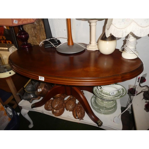 271 - A stunning oval coffee table on tripod base.