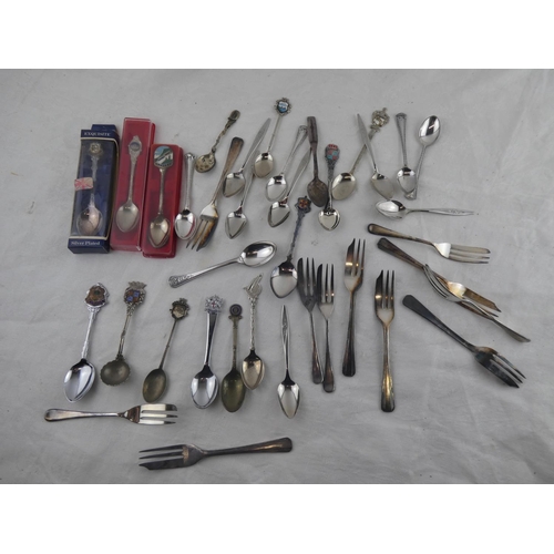 281 - An assortment of collectors spoons and more.