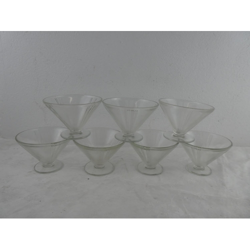 297 - A set of seven vintage glass dessert bowls.