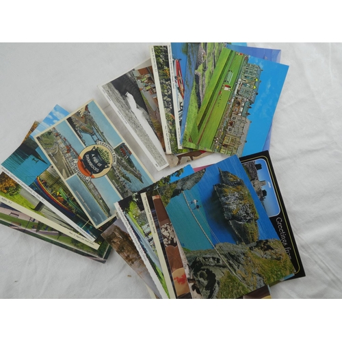 57 - A collection of various postcards.