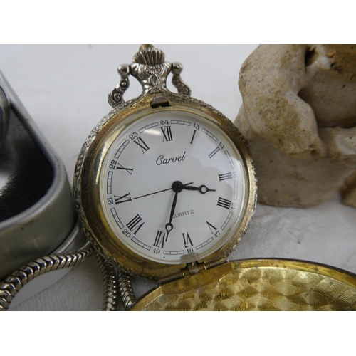 94 - An assorted lot of pocket watches and chains and more.