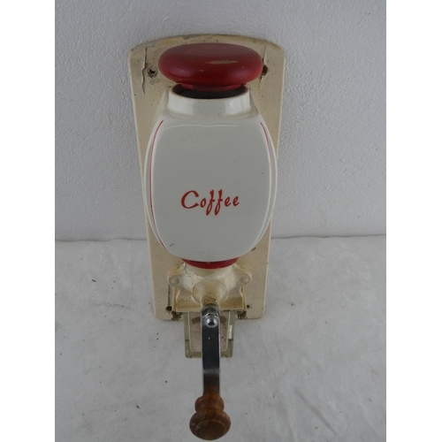 213 - A very nice 1950's enamel coffee grinder.