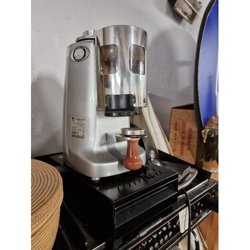 249 - A commercial coffee grinder.