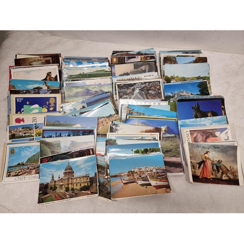 78 - A large collection of various postcards.