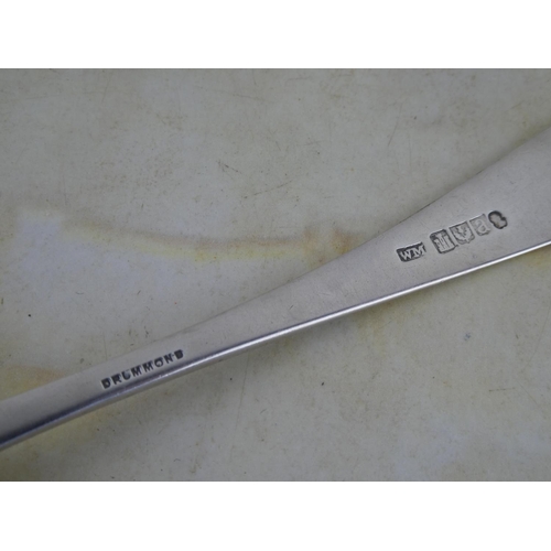 133 - A large antique/ Georgian Scottish silver serving spoon, crested with the letter 'H'.