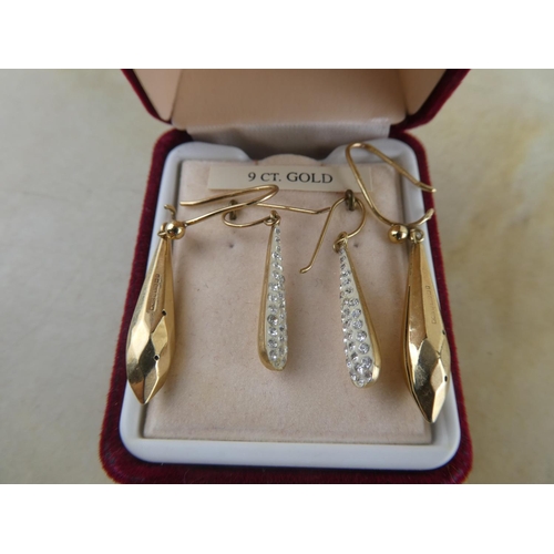 141 - Two pairs of 9ct gold droplet earrings.