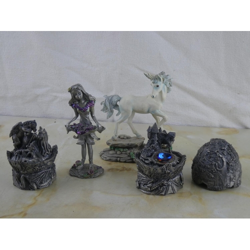 147 - A collection of Tudor Mint figurines and more.