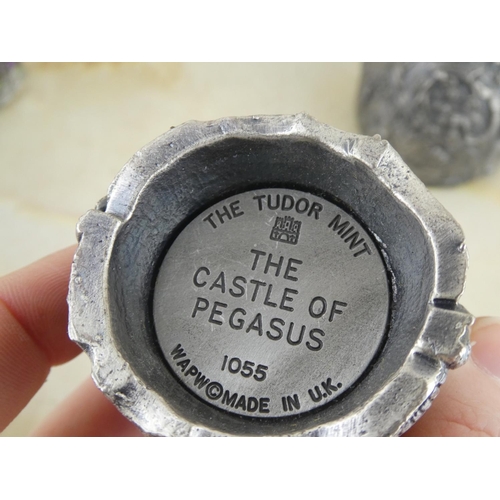 147 - A collection of Tudor Mint figurines and more.