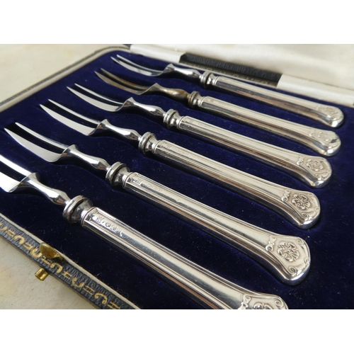 171 - A stunning boxed set of sterling silver pickle forks by Sharman D Neill, Belfast