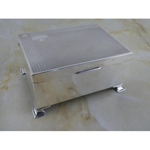 179 - A stunning antique/ Art Deco Sterling Silver cigarette box.
