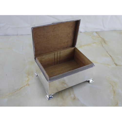 179 - A stunning antique/ Art Deco Sterling Silver cigarette box.
