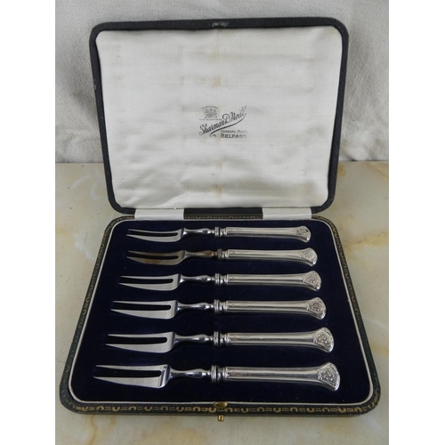 171 - A stunning boxed set of sterling silver pickle forks by Sharman D Neill, Belfast