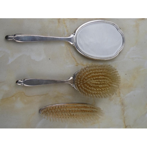 181 - A stunning three piece Sterling Silver dressing table set.