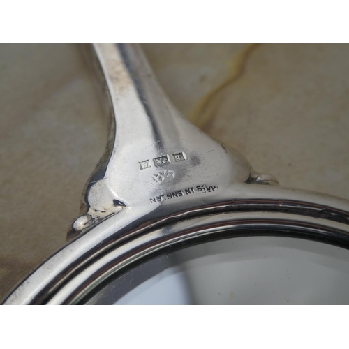 181 - A stunning three piece Sterling Silver dressing table set.