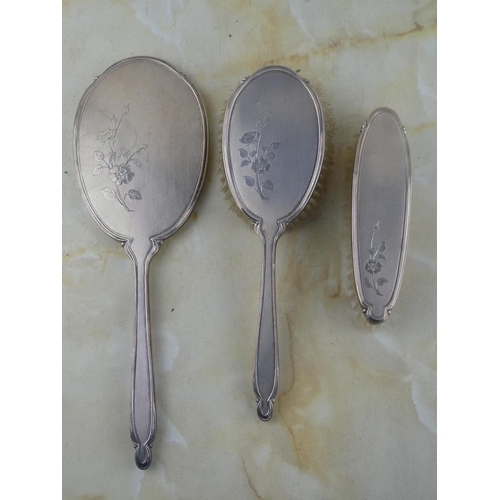 181 - A stunning three piece Sterling Silver dressing table set.