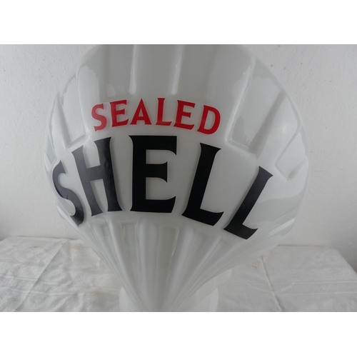 101 - A large reproduction glass clam shaped 'Shell' gas pump globe.