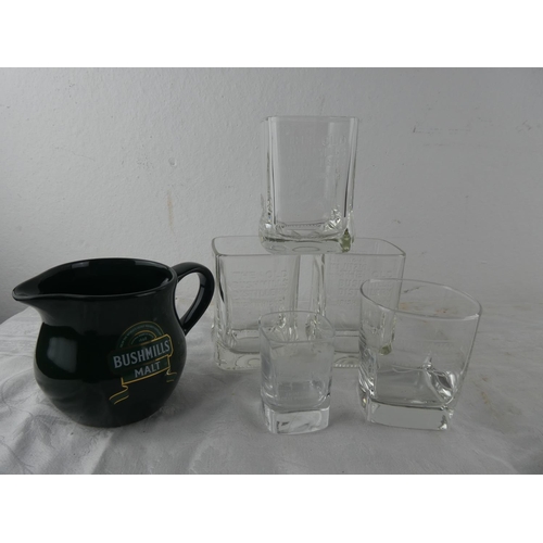 103 - An assortment of glass ware and a jug relating to the Old Bushmills Distillery.