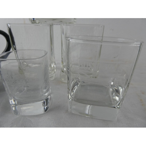 103 - An assortment of glass ware and a jug relating to the Old Bushmills Distillery.