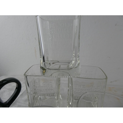 103 - An assortment of glass ware and a jug relating to the Old Bushmills Distillery.