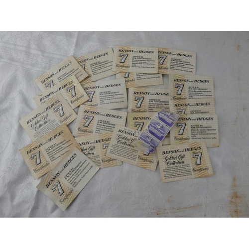106 - A large collection of Benson and Hedges '7' certificates and four vintage Supersave stamps.