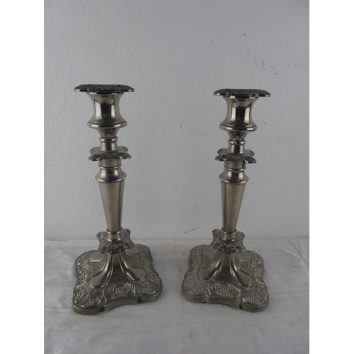 107 - A stunning pair of silver plated candlesticks.