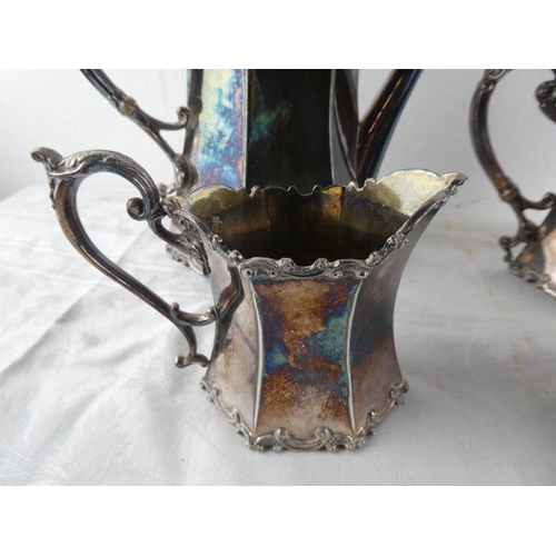 112 - A stunning four piece antique silver plated tea service.