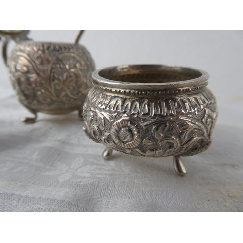 114 - A stunning antique three piece Indian Silver condiment set.