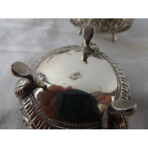 114 - A stunning antique three piece Indian Silver condiment set.