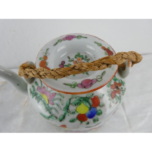 119 - An antique lidded Chinese teapot (a/f).