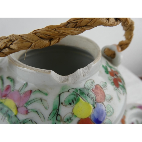 119 - An antique lidded Chinese teapot (a/f).