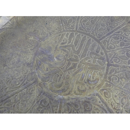 127 - A vintage brass tray with decorative design.