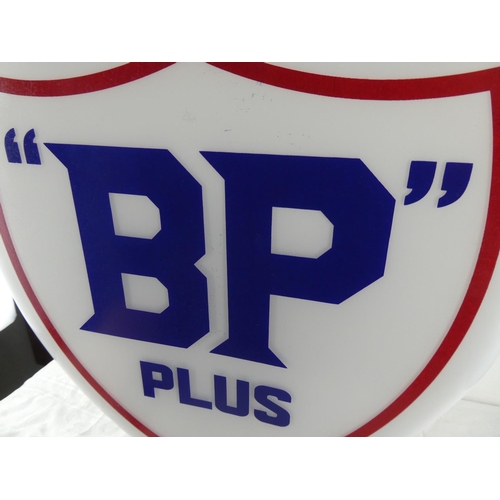 144 - A large reproduction glass 'BP Plus' globe.