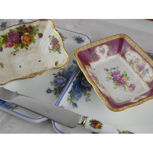 63 - Two Royal Albert 'Moonlight Rose' square plates, a Royal Albert 'Old Country Rose' dish and knife an... 