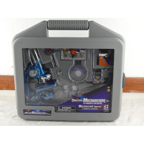 72 - A cased Deluxe Microscope Set.