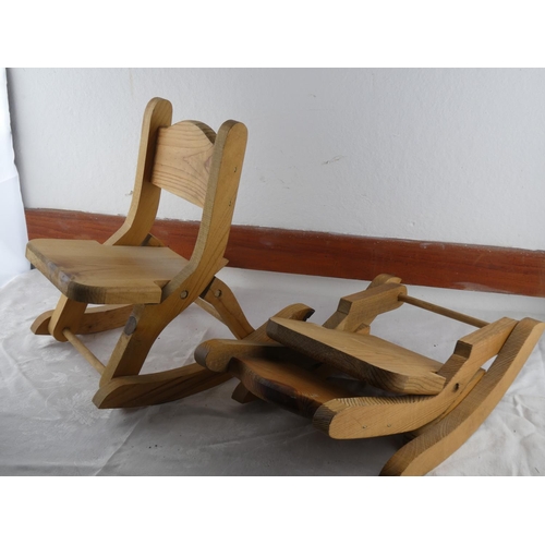 74 - A pair of pine miniature rocking chairs.