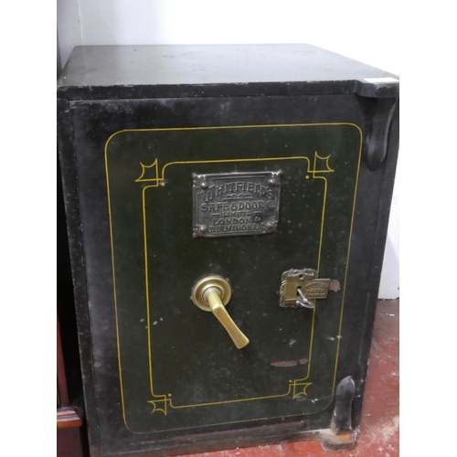 75 - An antique/ vintage Whitfields safe and key. (measuring 60x46x44cm).