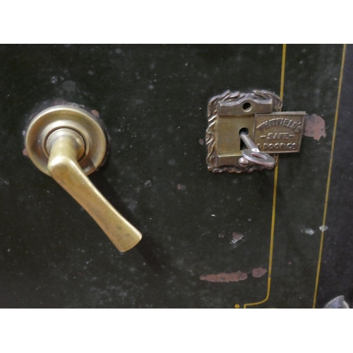 75 - An antique/ vintage Whitfields safe and key. (measuring 60x46x44cm).