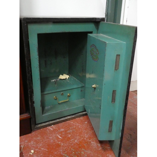 75 - An antique/ vintage Whitfields safe and key. (measuring 60x46x44cm).