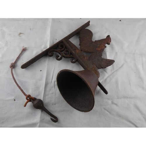 84 - A cast iron 'Hen' wall bracket and bell.